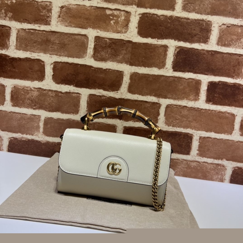 G*u*i top handle bags